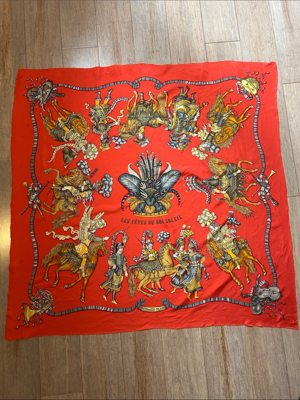 HERMES Silk Les Fetes du Roi Soleil Scarf 35”Red Illustrated Gold Black Accents